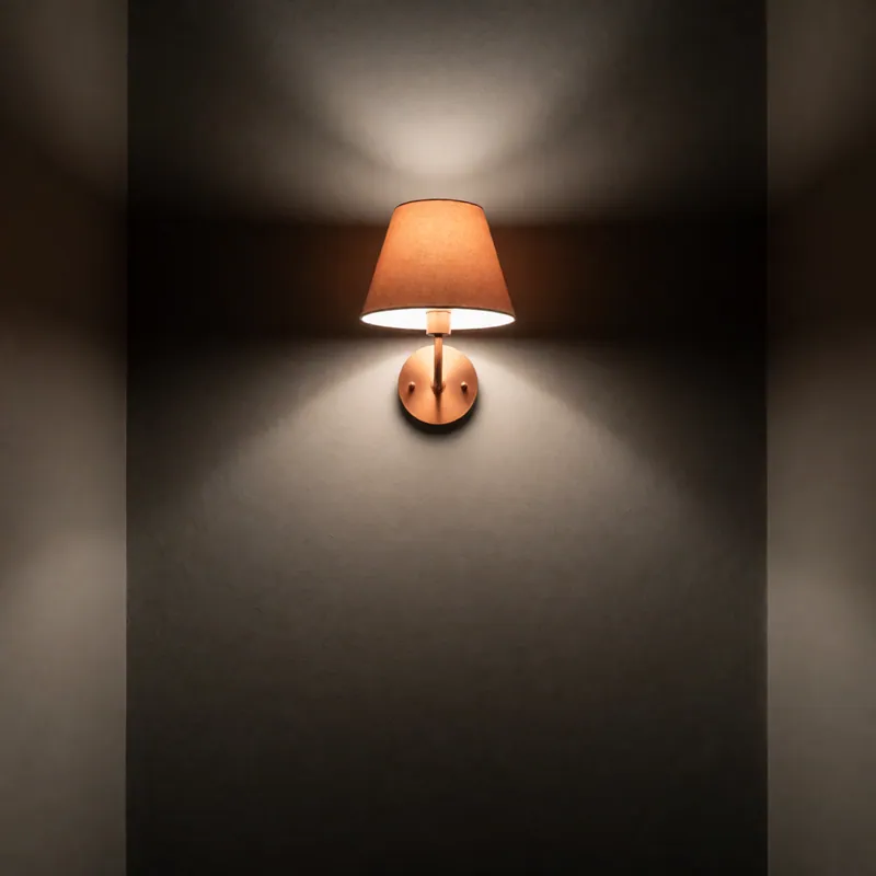 A wall sconce fitted in a Queens hallway, New York